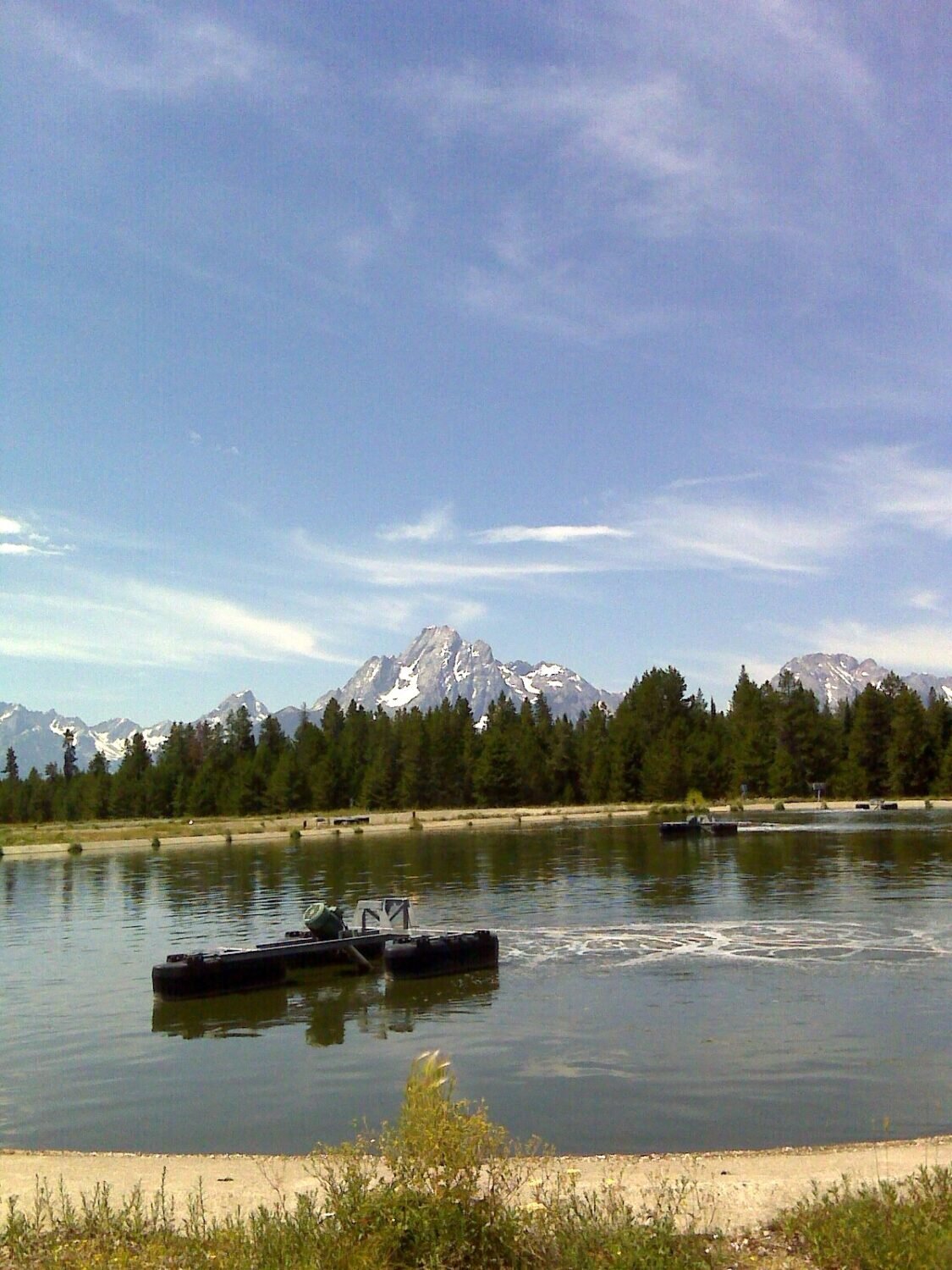 Float mounted aerators at a remote location near a mountain