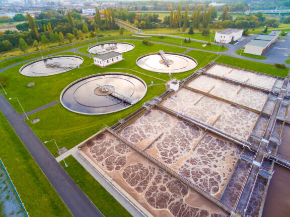 Aerial view of public sewage treatment plant for 165, 000 inhabitants of Pilsen city in Czech Republic, Europe. Environment and industry from above.